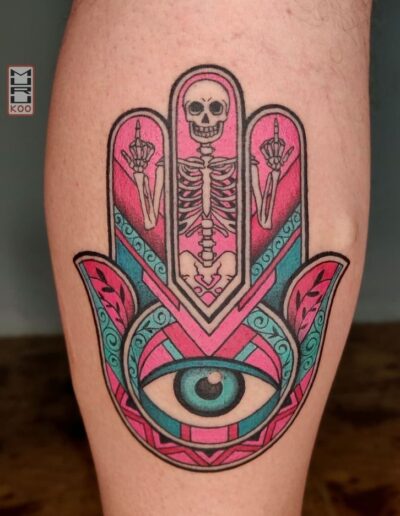 Hamsa with a skeleton tattoo (artist unknown) via Pinterest